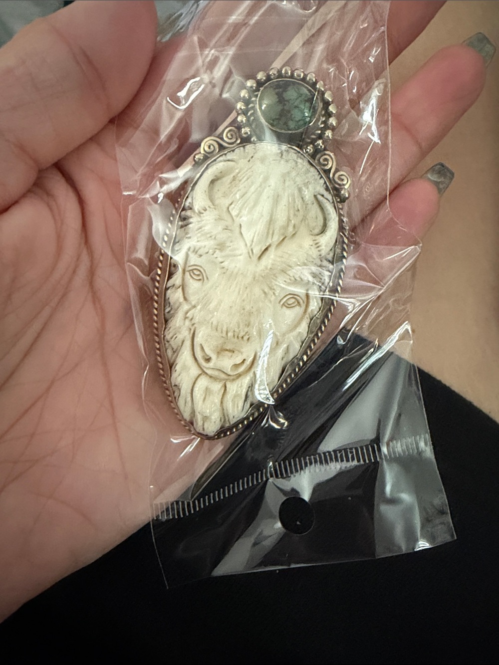Buffalo Carved Pendant Necklace in Ivory and Turquoise Accent